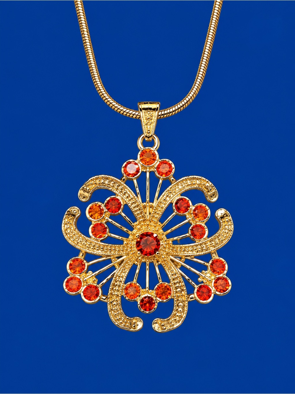 Gold Pendant Necklace with Red Garnet Accents